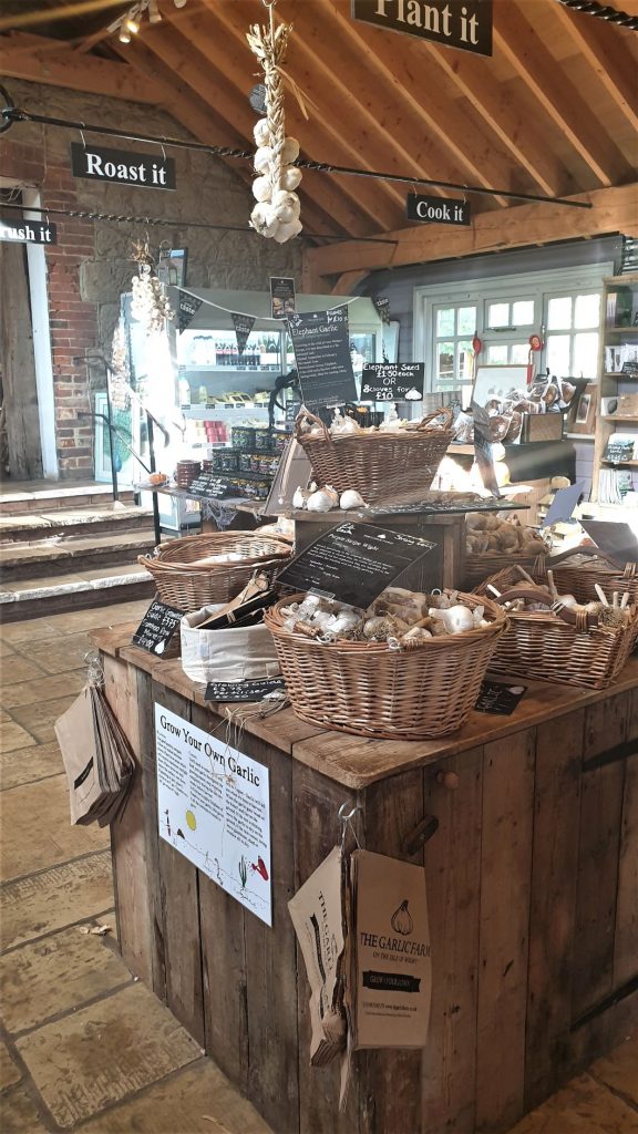 Garlic Farm shop, with baskets full of garlic