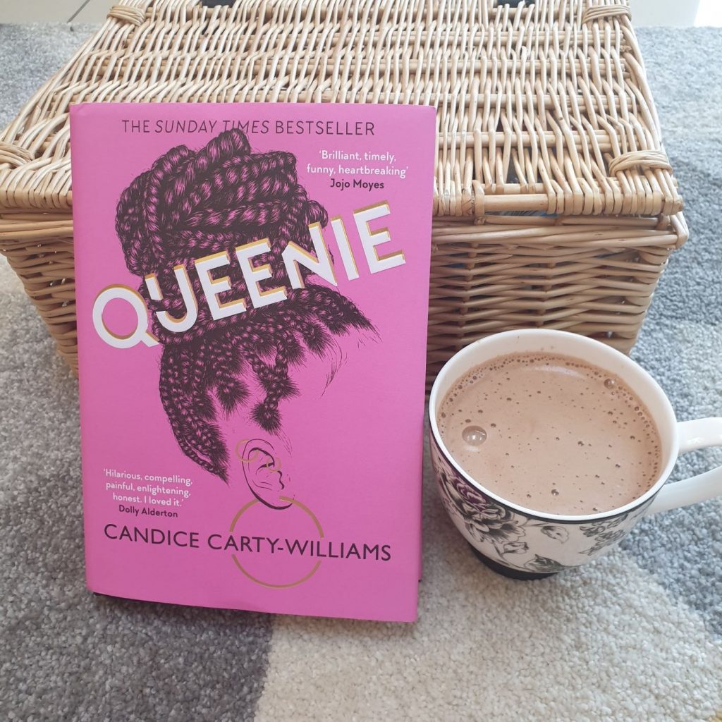 Pink hardback edition of Queenie by Candice Carty Williams